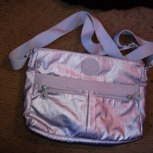 Awesome metallic lavender Kipling bag 8x12 with 6 pockets great condition